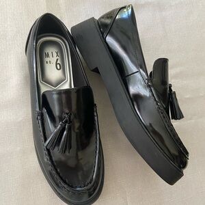 Black chunky loafers with tassels